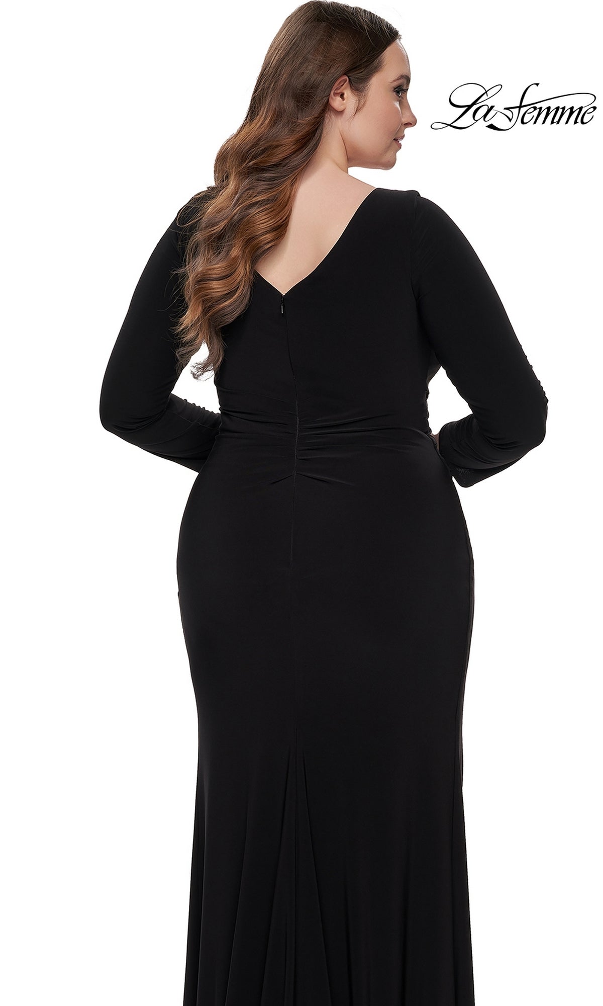 Woman in a La Femme Plus-Size Black Jersey Formal Dress 32191, long sleeve and formal, shown from the back on a white background with the